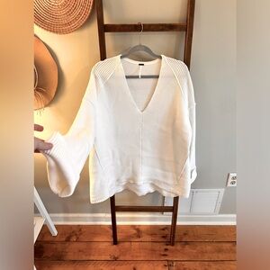 Women’s Free People bell sleeve sweater.
